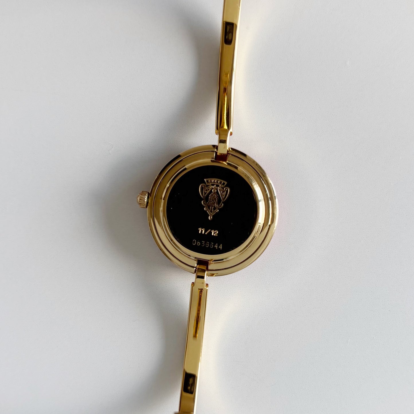 Gucci 1990s Interchangeable Bezel Gold Plated Bangle Watch with 12 bezels, case