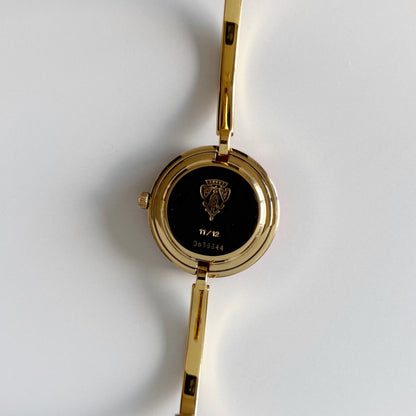 Gucci 1990s Interchangeable Bezel Gold Plated Bangle Watch with 12 bezels, case
