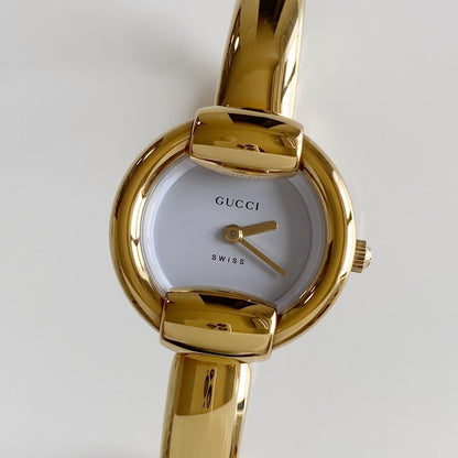 Gucci 1990s Round Dial Gold Plated Bangle Watch