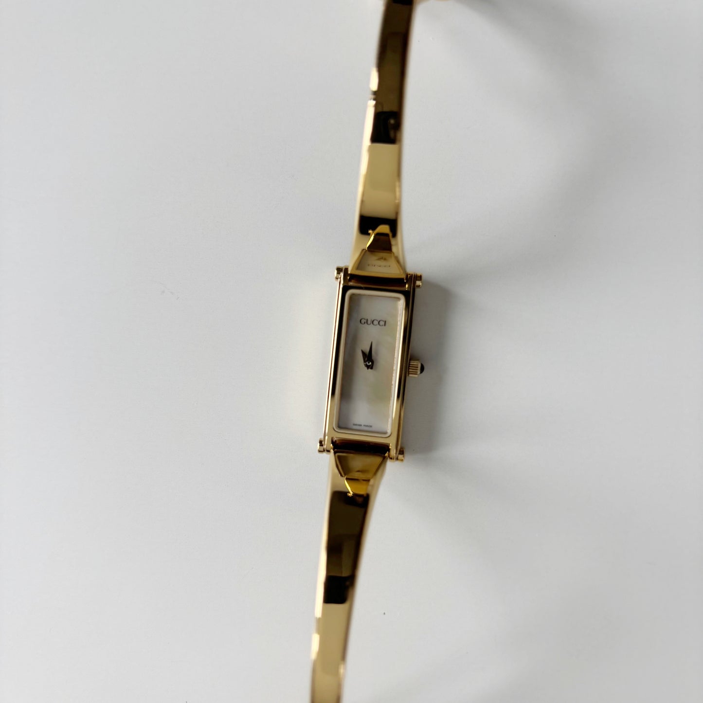 Gucci 1990s Seashell Rectangular Dial Gold Plated Bangle Watch
