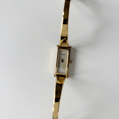 Gucci 1990s Seashell Rectangular Dial Gold Plated Bangle Watch