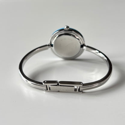 Gucci 1990s Interchangeable Bezel Stainless steel Bangle Watch with 12 bezels, case (Small)
