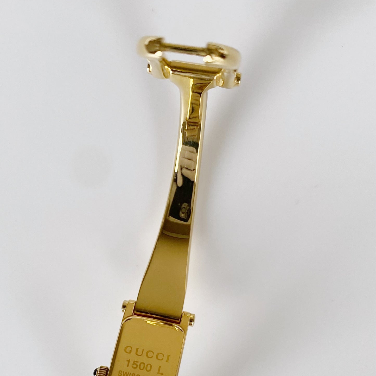 Gucci 1990s Black Dial Rectangular Gold Plated Bangle Watch