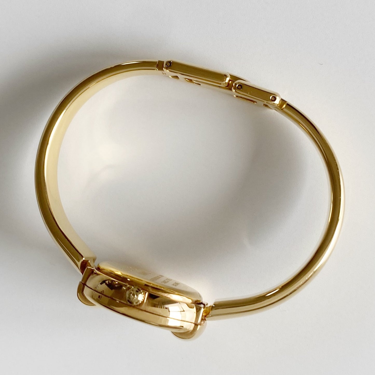 Gucci 1990s Round Dial Gold Plated Bangle Watch
