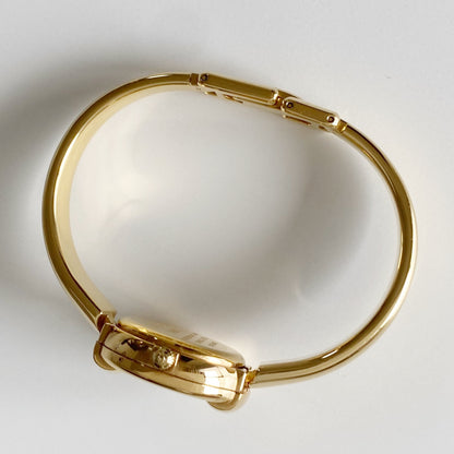 Gucci 1990s Round Dial Gold Plated Bangle Watch