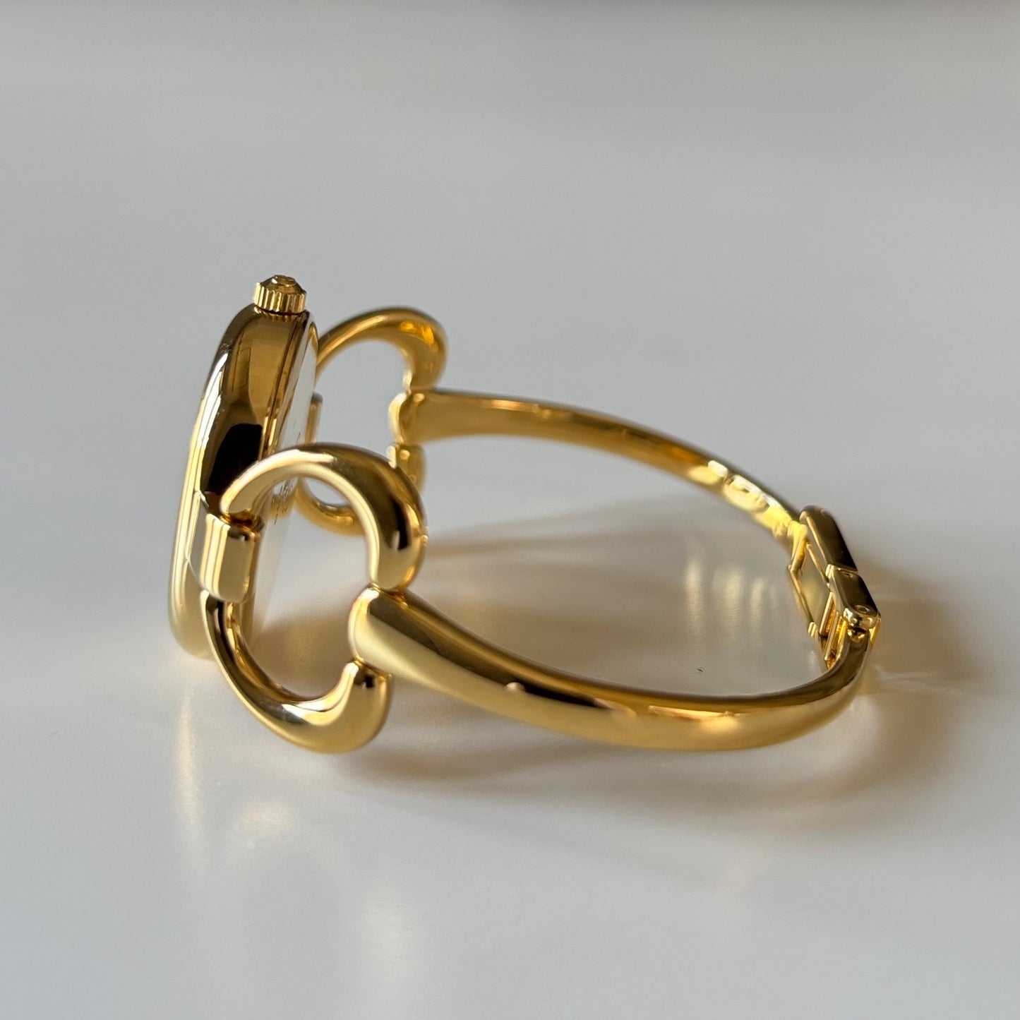 Gucci 1990s Oval Gold Dial Gold Plated Bangle Watch (Small)
