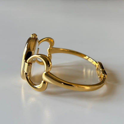 Gucci 1990s Oval Gold Dial Gold Plated Bangle Watch (Small)