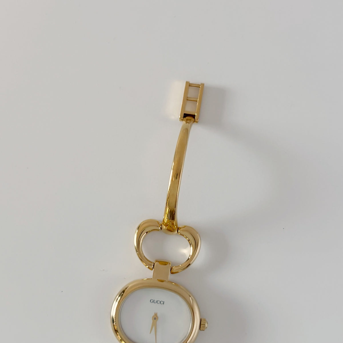 Gucci 1990s Seashell Oval Dial Gold-Plated Bangle Watch (Small)