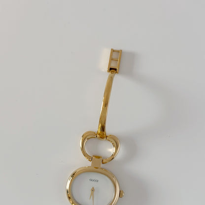 Gucci 1990s Seashell Oval Dial Gold-Plated Bangle Watch (Small)