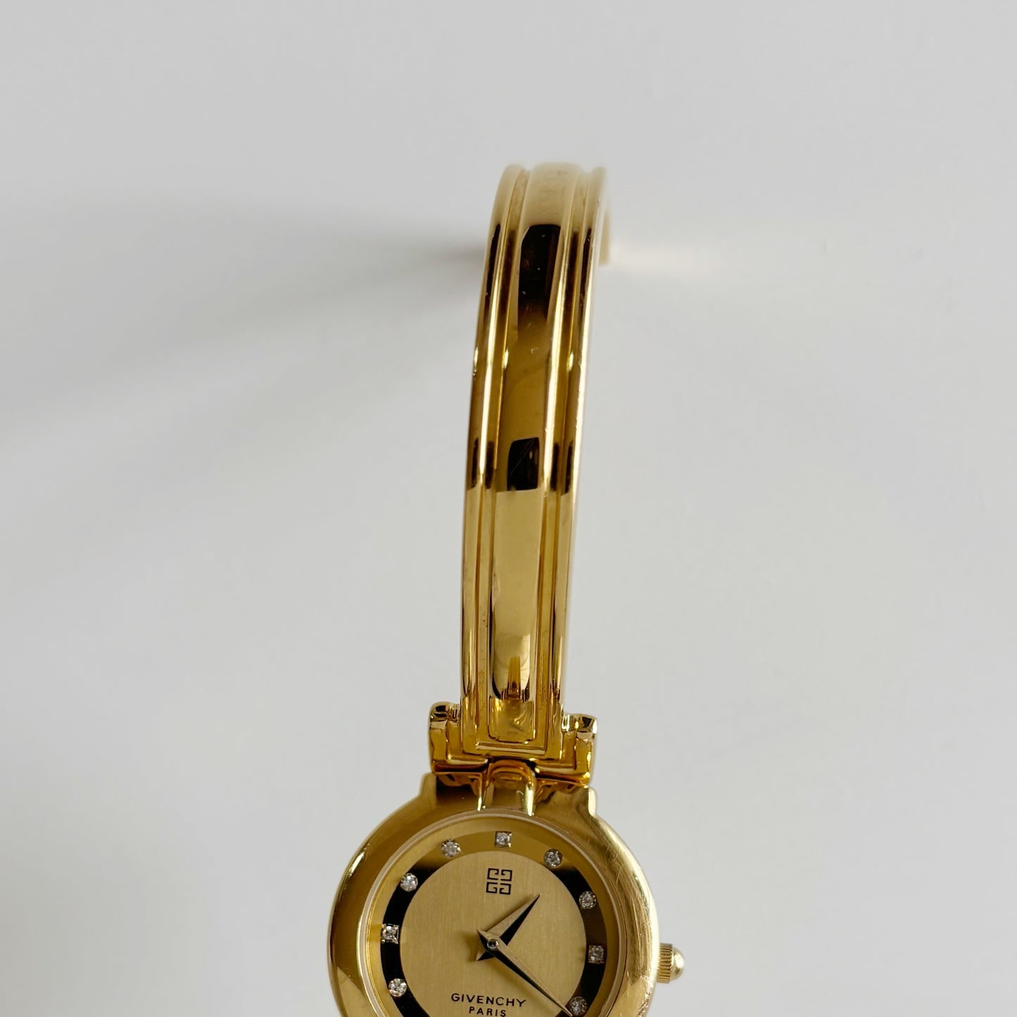 Givenchy 1990s Round Dial Gold Plated Bangle Watch