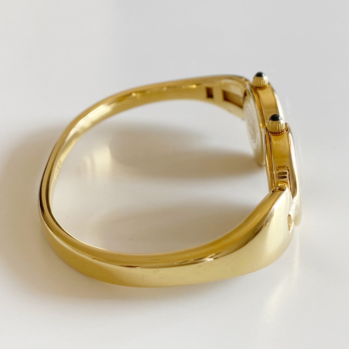 Fendi 1990s Seashell Dial Two Time Zone Gold Plated Bangle Watch