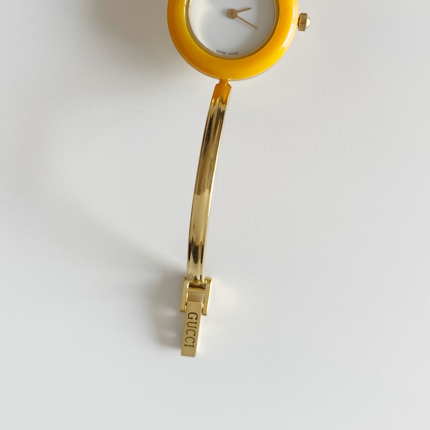 Gucci 1990s Interchangeable Bezel Gold Plated Bangle Watch with 12 bezels, case