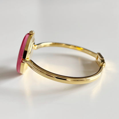 Gucci 1990s Interchangeable Bezel Gold Plated Bangle Watch with 12 bezels, case