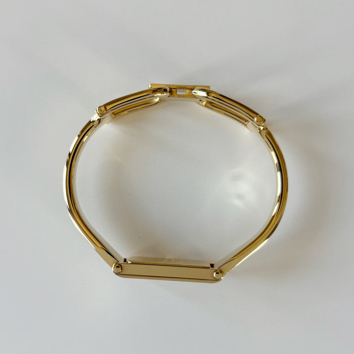 Gucci 1990s Rectangular Gold Dial Gold-Plated Watch