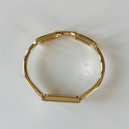 Gucci 1990s Rectangular Gold Dial Gold-Plated Watch