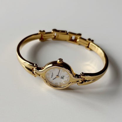 Burberry 1990s Round Dial Gold Plated Bangle Watch