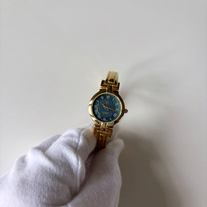 Givenchy 1990s Round Dial Gold Plated Bangle Watch