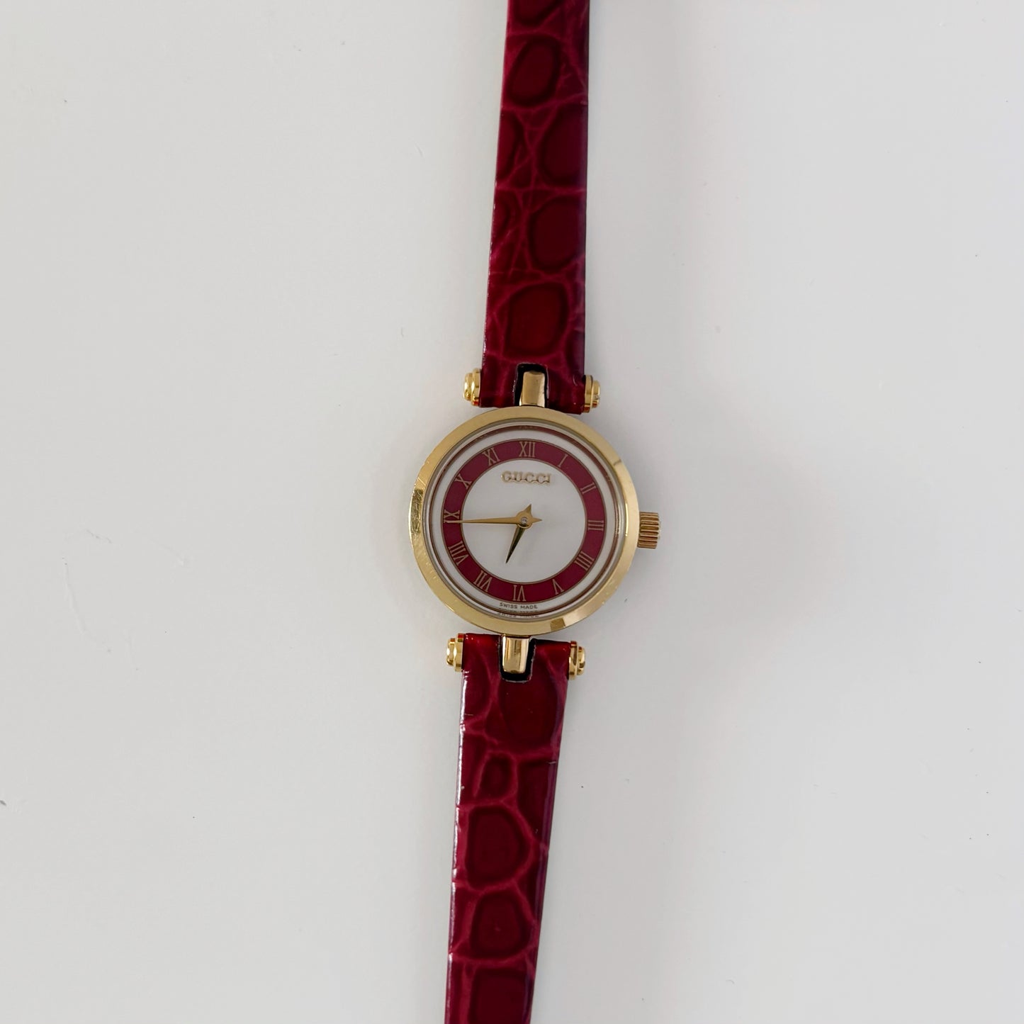 Gucci 1990s Red Dial Sherry Gold Plated Watch