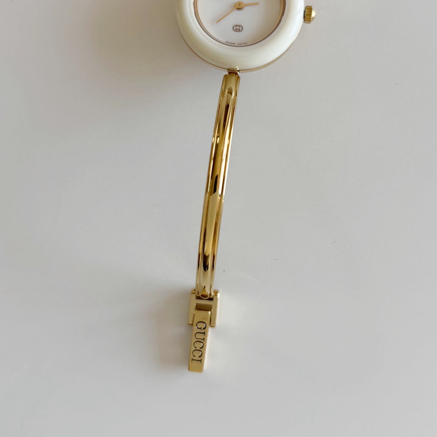 Gucci 1980s Interchangeable Bezel Gold Plated Bangle Watch with 12 bezels, case