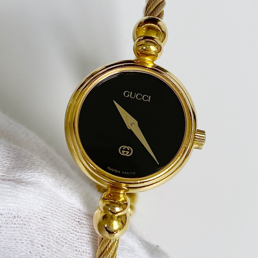 Gucci 1990s Black Dial Gold Plated Bangle Watch