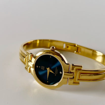 Givenchy 1990s Navy Round Dial Gold Plated Bangle Watch
