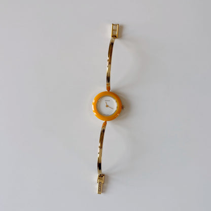 Gucci 1990s Interchangeable Bezel Gold Plated Bangle Watch with 12 bezels, case