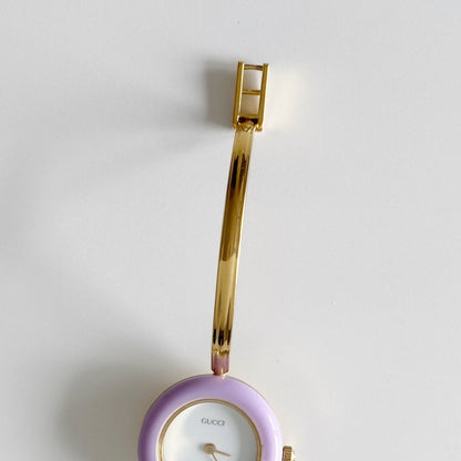 Gucci 1990s Interchangeable Bezel Gold Plated Bangle Watch with 12 bezels, case