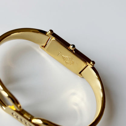 Gucci 1990s Black Dial Gold Plated Bangle Watch