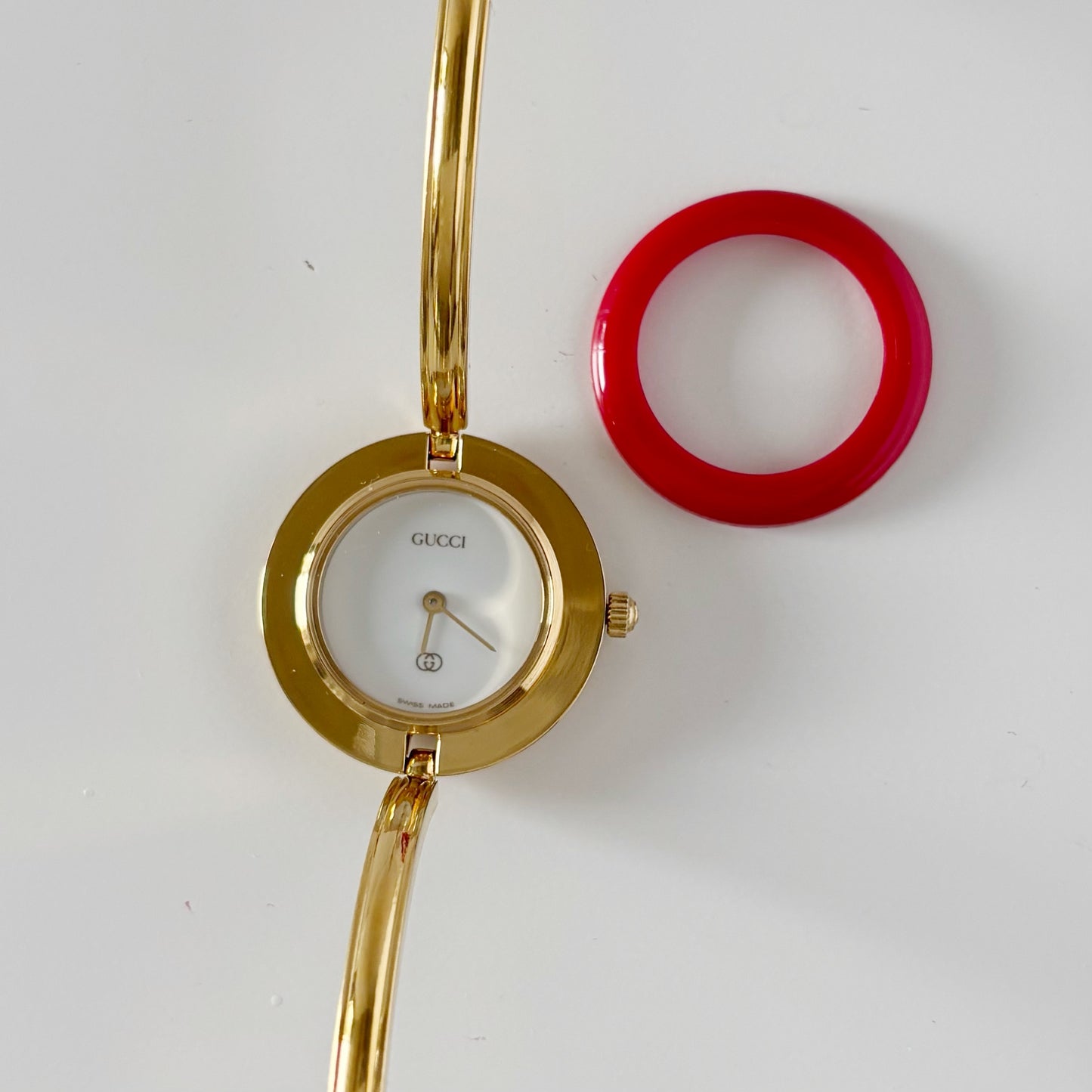 Gucci 1990s Interchangeable Bezel Gold Plated Bangle Watch with 12 bezels, case
