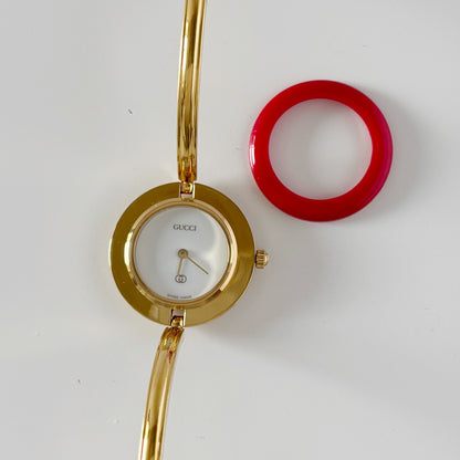 Gucci 1990s Interchangeable Bezel Gold Plated Bangle Watch with 12 bezels, case