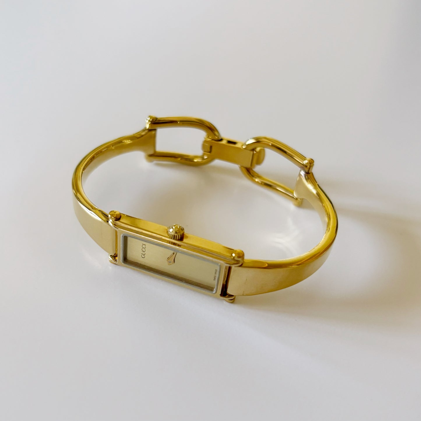 Gucci 1990s Rectangular Gold Plated Bangle Watch