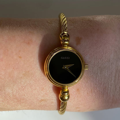 Gucci 1990s Black Dial Gold Plated Bangle Watch