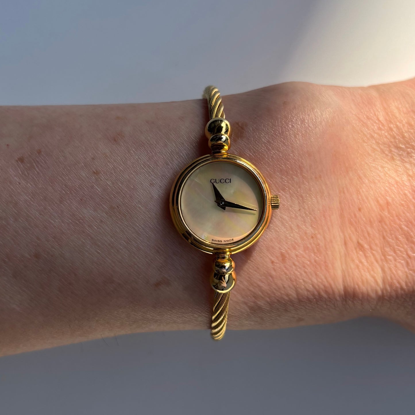Gucci 1990s Seashell Dial Gold Plated Cable Bangle Watch