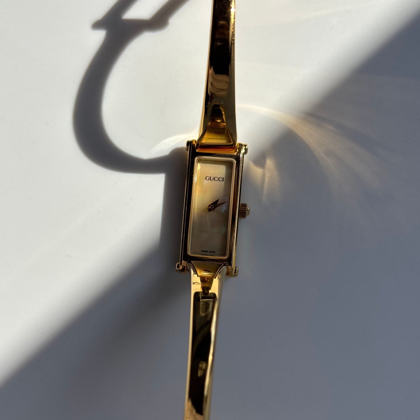 Gucci 1990s Rectangular Seashell Dial Gold Plated Bangle Watch