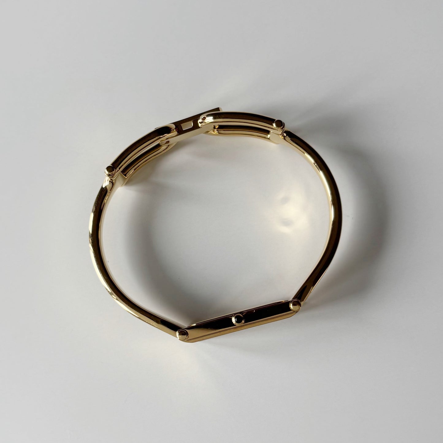 Gucci 1990s Seashell Rectangular Dial Gold Plated Bangle Watch