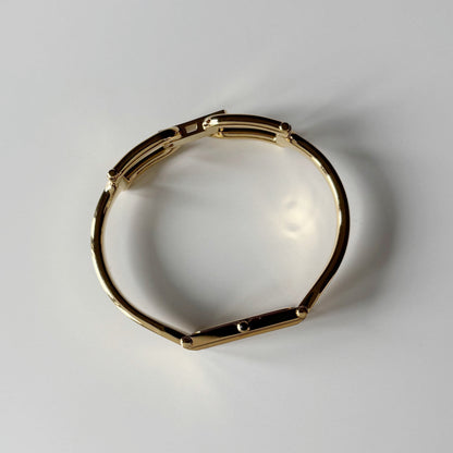 Gucci 1990s Seashell Rectangular Dial Gold Plated Bangle Watch