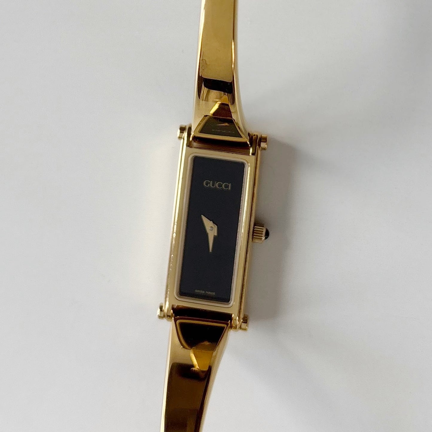 Gucci 1990s Black Rectangular Dial Gold Plated Bangle Watch