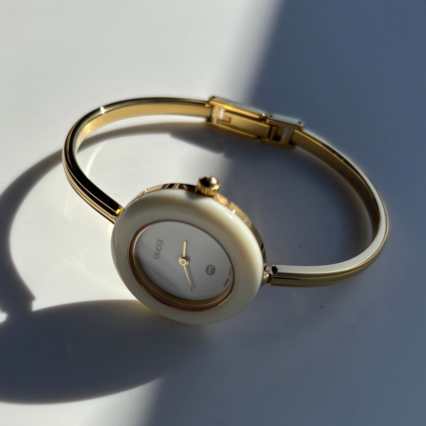 Gucci 1980s Interchangeable Bezel Gold Plated Bangle Watch with 12 bezels, case