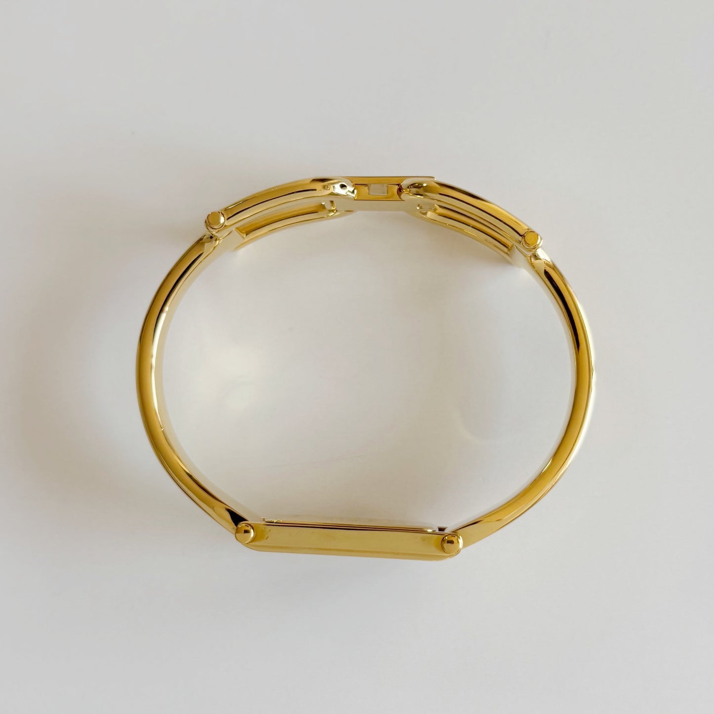 Gucci 1990s Black Dial Gold Plated Bangle Watch