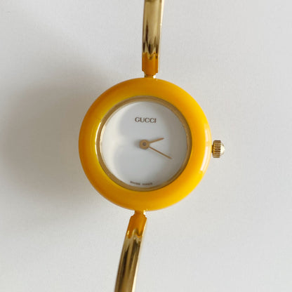 Gucci 1990s Interchangeable Bezel Gold Plated Bangle Watch with 12 bezels, case