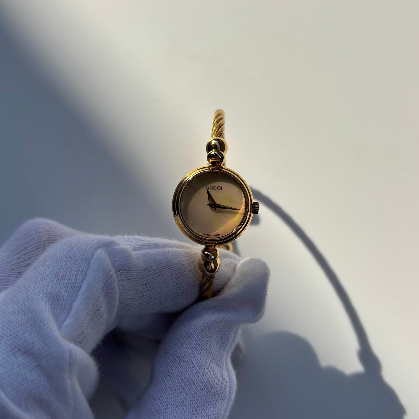 Gucci 1990s Seashell Dial Gold Plated Cable Bangle Watch