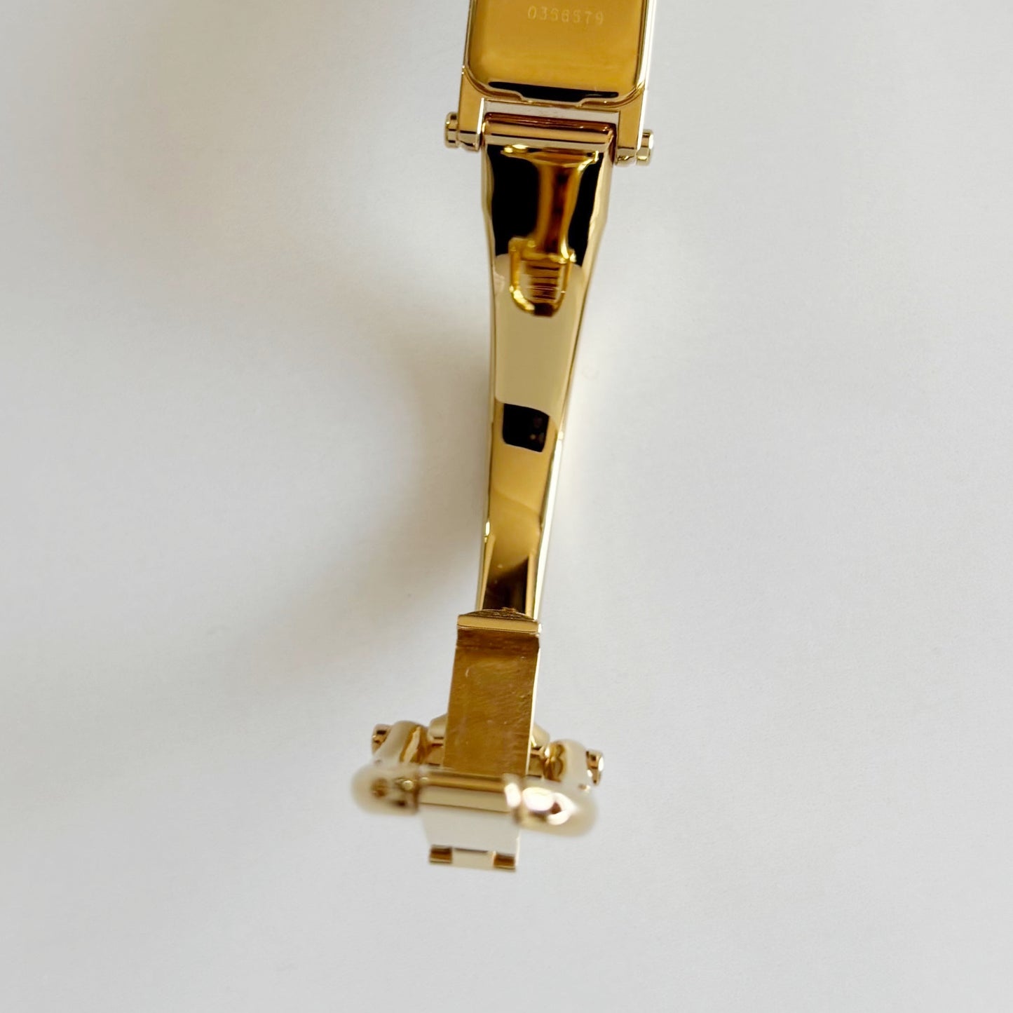 Gucci 1990s Rectangular Dial Gold Plated Bangle Watch