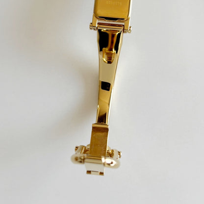 Gucci 1990s Rectangular Dial Gold Plated Bangle Watch