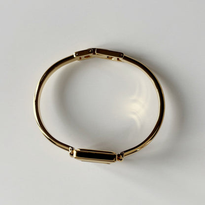 Gucci 1990s Square Dial Gold Plated Bangle Watch