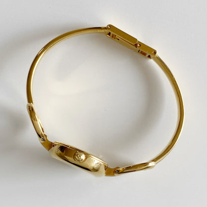 Gucci 1990s Black Dial Gold Plated Bangle Watch
