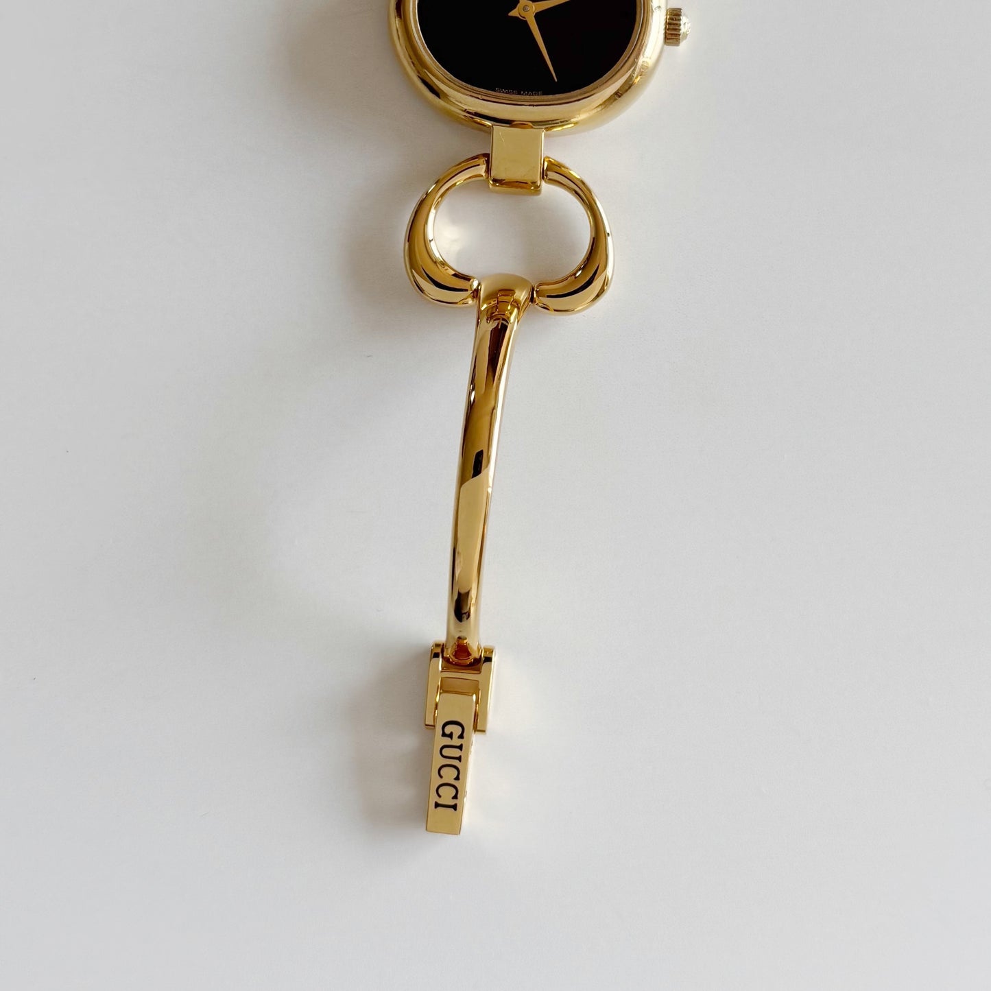 Gucci 1990s Oval Black Dial Gold Plated Bangle Watch (Small)