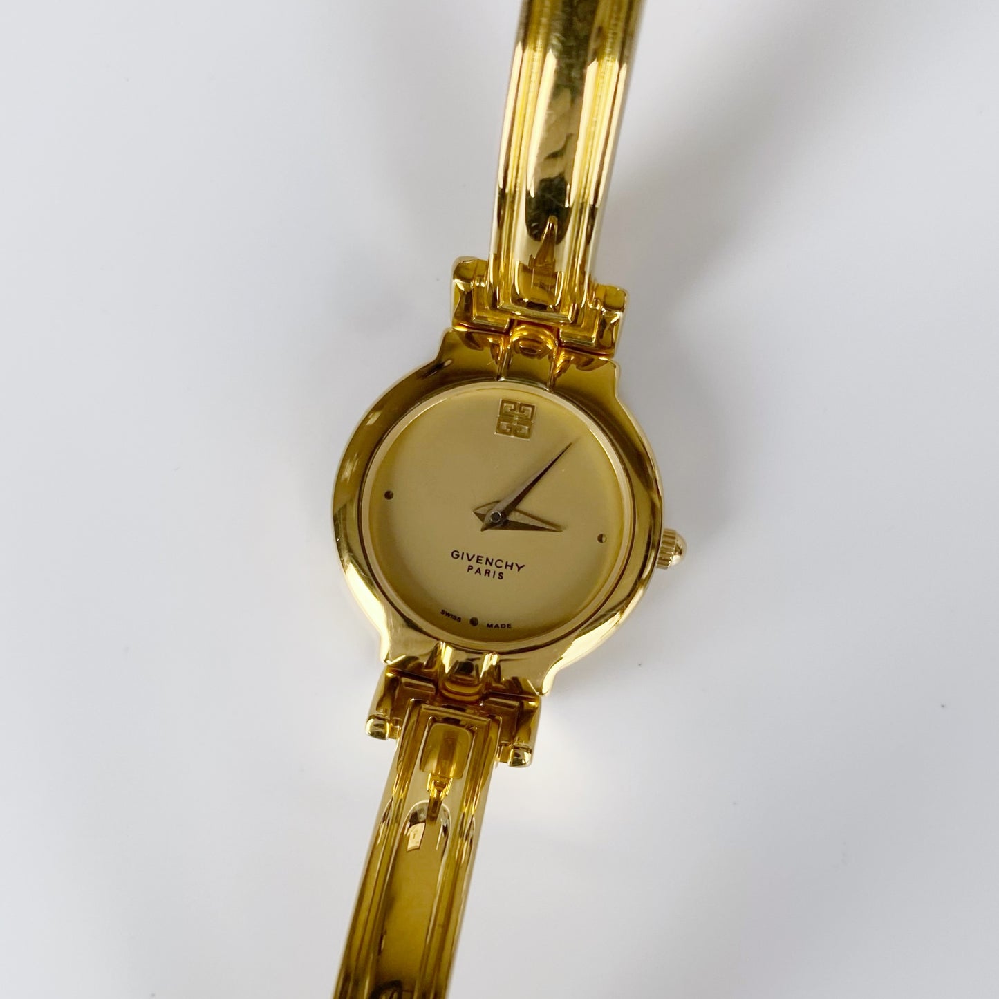 Givenchy 1990s Gold Plated Round Bangle Watch