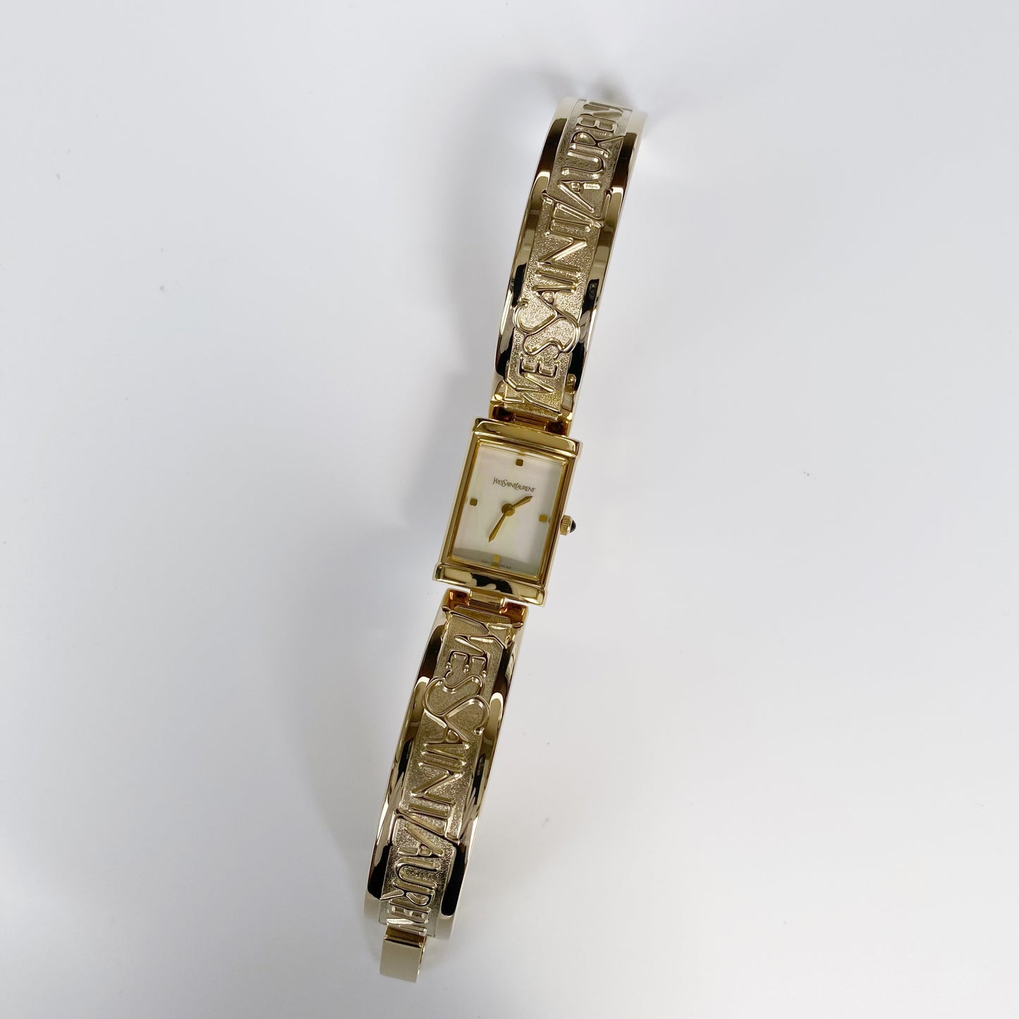 Yves Saint Laurent 1990s Seashell Dial Gold Plated Bangle Watch