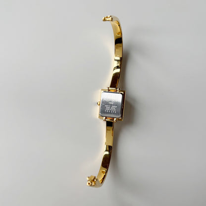Yves Saint Laurent 1990s Seashell Dial Gold Plated Bangle Watch