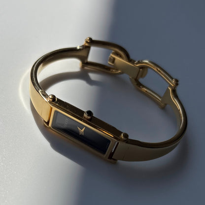 Gucci 1990s Black Dial Gold Plated Bangle Watch